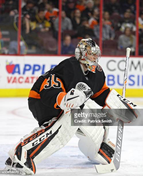 Goalie Steve Mason of the Philadelphia Flyers tends the net against the Pittsburgh Penguins during the first period at Wells Fargo Center on March...