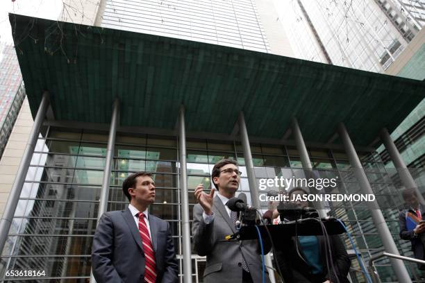 Washington State Attorney General Bob Ferguson , Solicitor General Noah Purcell and Civil Rights Unit Chief Colleen Melody address the media...