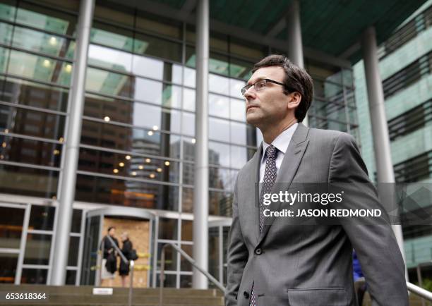 Washington State Attorney General Bob Ferguson waits to addresses the media following a hearing about US President Donald Trump's travel ban at the...