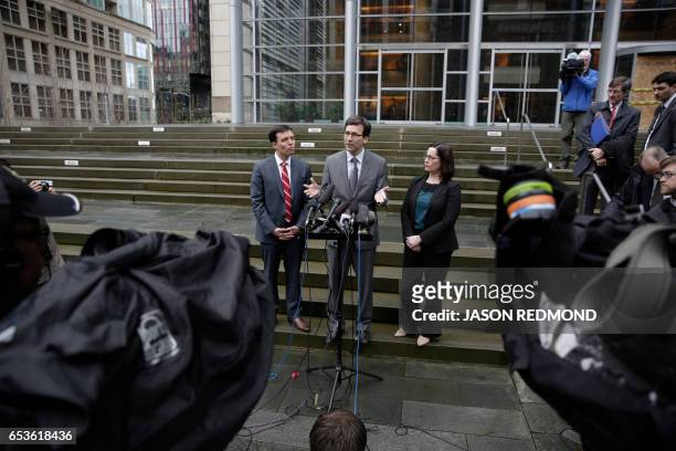 Washington State Attorney General Bob Ferguson , Solicitor General Noah Purcell and Civil Rights Unit Chief Colleen Melody address the media...
