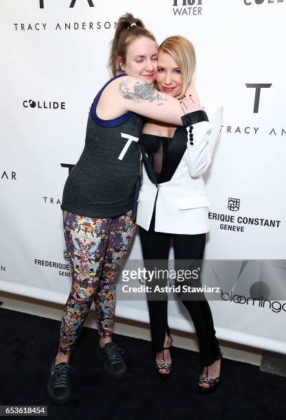 Actress Lena Dunham hugs celebrity trainer Tracy Anderson during the celebration of the Tracy Anderson 59th Street studio on March 15, 2017 in New...