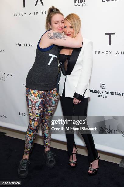 Lena Dunham and Tracy Anderson pose during the Tracy Anderson Flagship Studio opening at Tracy Anderson Flagship Studio on March 15, 2017 in New York...