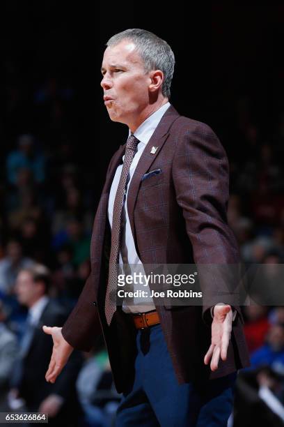 Head coach Andy Enfield of the USC Trojans reacts in the first half against the Providence Friars during the First Four game in the 2017 NCAA Men's...
