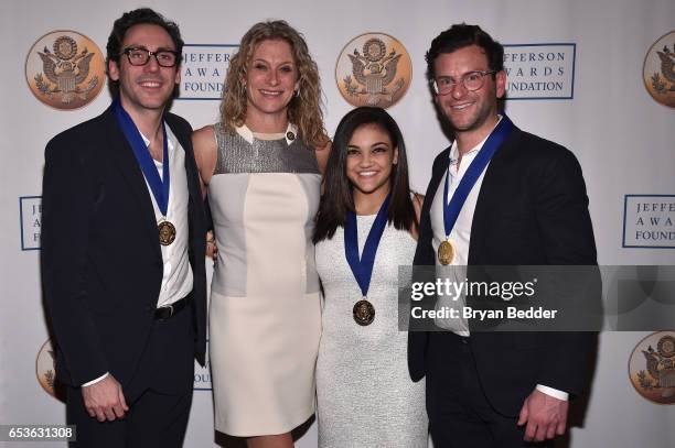 Executive Director of Jefferson Awards Foundation Hillary Schafer poses with Dave Gilboa, and Neil Blumenthal of Warby Parker and US Olympic gymnast...