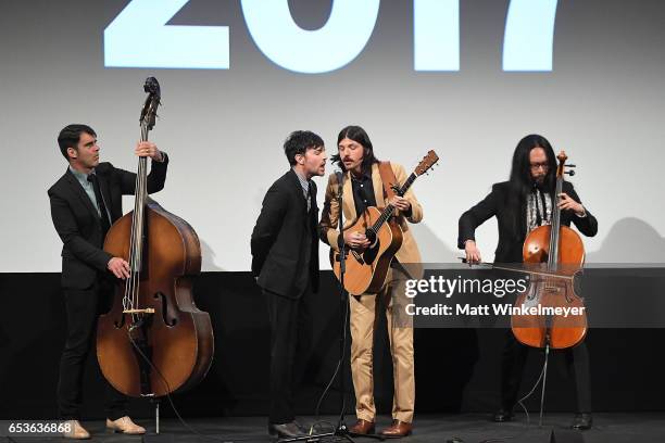 Bob Crawford, Scott Avett, Seth Avett, and Joe Kwon of The Avett Brothers perform during the "May It Last: A Portrait Of The Avett Brothers"premiere...