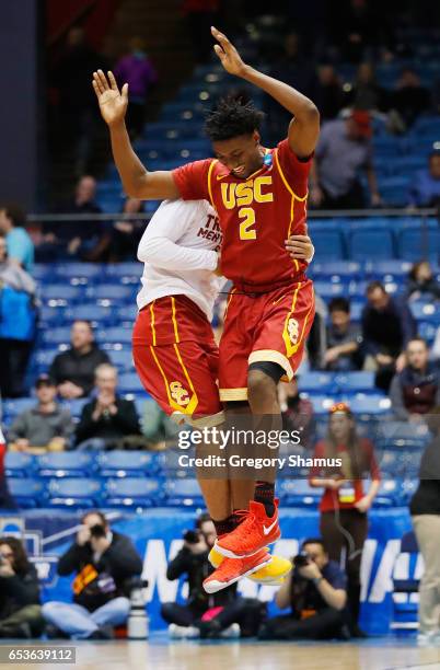 Jonah Mathews of the USC Trojans celebrates defeating the Providence Friars 75-71 during the First Four game in the 2017 NCAA Men's Basketball...