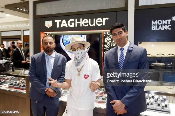 Nikhil Bhindi, artist Alec Monopoly and Ashwin Bhindi attend TAG Heuer Connected Watch V2 Popup Store Inauguration at Bhindi's on March 15, 2017 in...