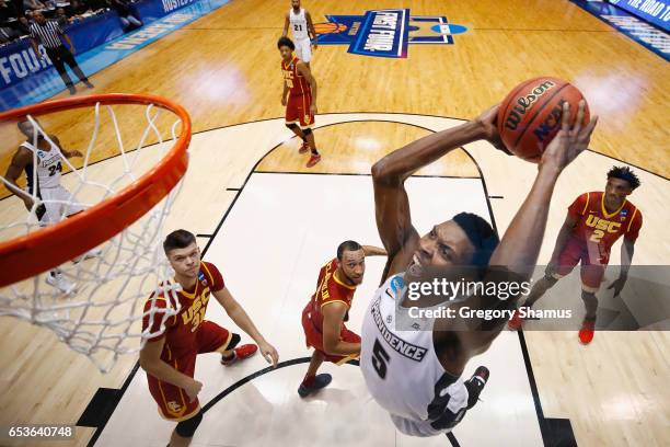 Rodney Bullock of the Providence Friars dunks the ball in the first half against the USC Trojans during the First Four game in the 2017 NCAA Men's...