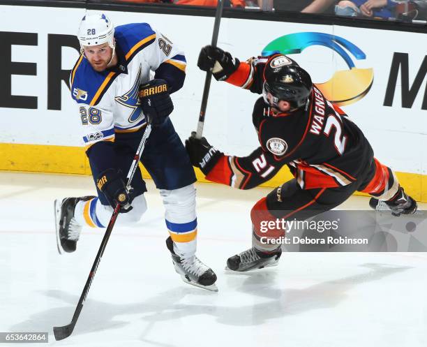 Kyle Brodziak of the St. Louis Blues battles against Chris Wagner of the Anaheim Ducks during the game on March 15, 2017 at Honda Center in Anaheim,...