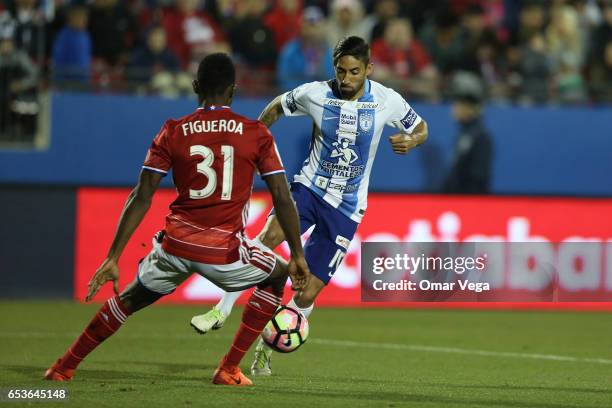 Brian Rodriguez of Pachuca and Maynor Figueroa vie for the ball during the semifinals first leg match between FC Dallas and Pachuca as part of the...