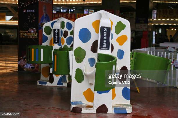 Public street urinals seen next to the recreational facilities at Foreigners' Street on March 15, 2017 in Chongqing, China. The public street urinals...