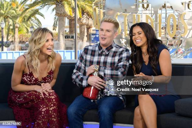 Charissa Thompson, Mark McGrath and Tracey Edmonds visit "Extra" at Universal Studios Hollywood on March 15, 2017 in Universal City, California.