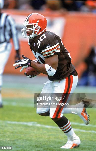 Jamel White of the Cleveland Browns carries the ball during the game against the Philadelphia Eagles at the Cleveland Stadium in Cleveland, Ohio. The...