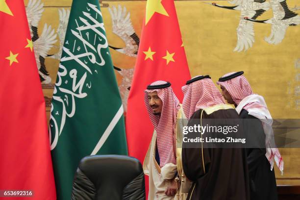 Saudi Arabia's King Salman bin Abdulaziz Al Saud attends a signing ceremony at the Great Hall of the People on March 16, 2017 in Beijing, China. At...