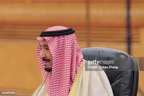 Saudi Arabia's King Salman bin Abdulaziz Al Saud during his meeting with Chinese President Xi Jinping at the Great Hall of the People on March 16,...