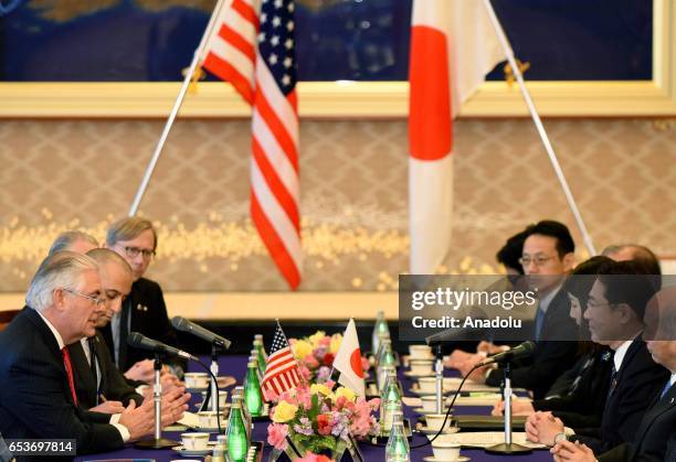 Secretary of State Rex Tillerson speaks with his Japanese counterpart Fumio Kishida during their joint press conference at the Iikura Guesthouse in...