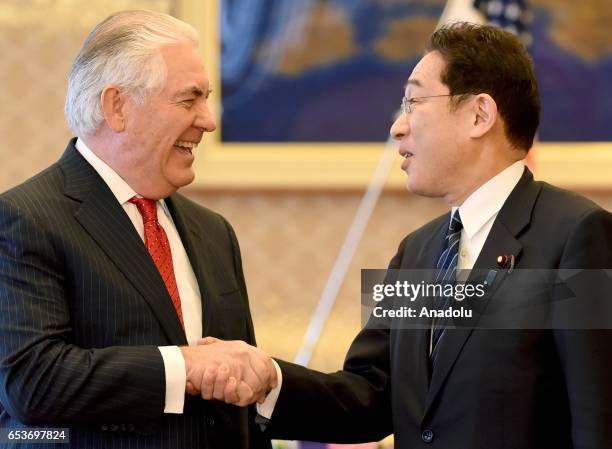 Secretary of State Rex Tillerson is welcomed by his Japanese counterpart Fumio Kishida ahead of their joint press conference at the Iikura Guesthouse...