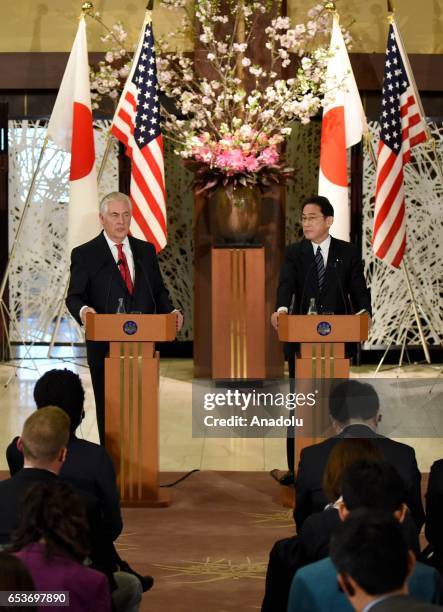 Secretary of State Rex Tillerson answers press members' questions beside his Japanese counterpart Fumio Kishida during their joint press conference...