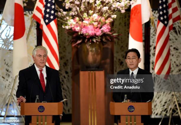 Secretary of State Rex Tillerson answers press members' questions beside his Japanese counterpart Fumio Kishida during their joint press conference...