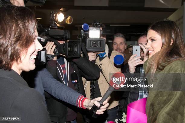 Laurence Druart welcomes her daughter Miss Universe Iris Mittenaere as she arrives at Aeroport Roissy - Charles de Gaulle on March 16, 2017 in Paris,...