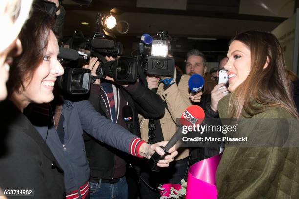Laurence Druart welcomes her daughter Miss Universe Iris Mittenaere as she arrives at Aeroport Roissy - Charles de Gaulle on March 16, 2017 in Paris,...
