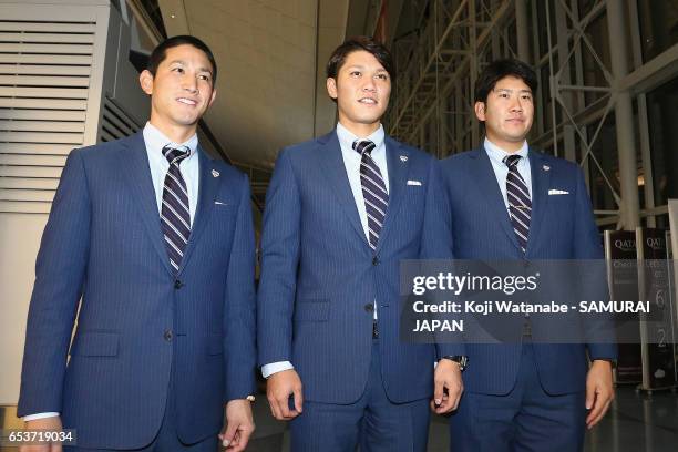 Catcher Seiji Kobayashi, Infielder Hayato Sakamoto and Pitcher Tomoyuki Sugano of Japan pose for photographs on departure for the United States for...