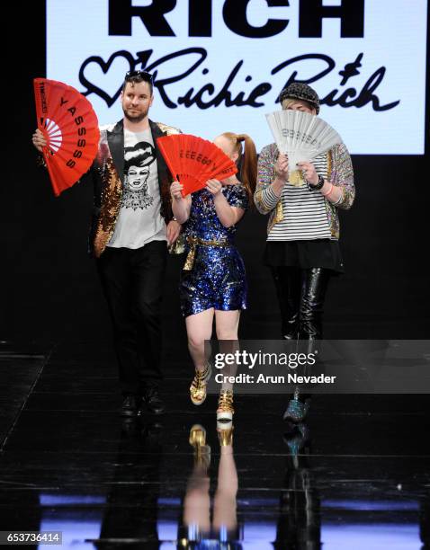 Designer Richie Rich and model/designer Madeline Stuart walk the runway with a model at Art Hearts Fashion LAFW Fall/Winter 2017 - Day 2 at The...