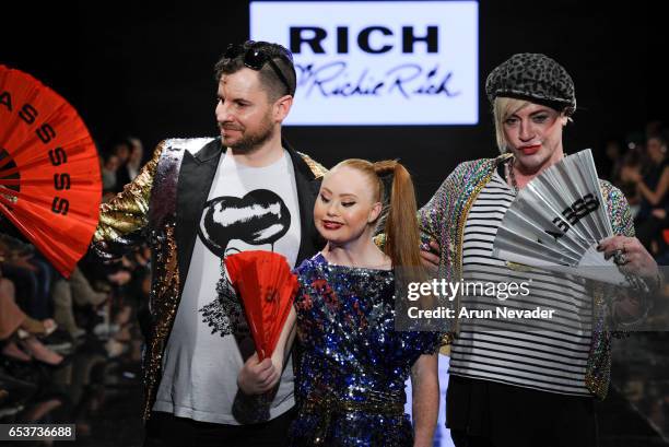 Designer Richie Rich and model/designer Madeline Stuart walk the runway with a model at Art Hearts Fashion LAFW Fall/Winter 2017 - Day 2 at The...