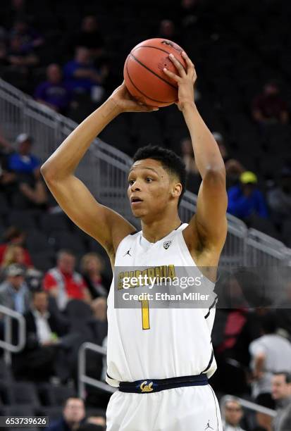 Ivan Rabb of the California Golden Bears looks to pass against the Oregon State Beavers during a first-round game of the Pac-12 Basketball Tournament...