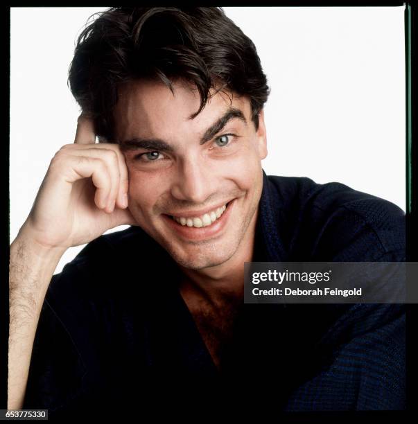 Deborah Feingold/Corbis via Getty Images) NEW YORK Actor Peter Gallagher posing for a portrait in 1987 in New York City, New York.