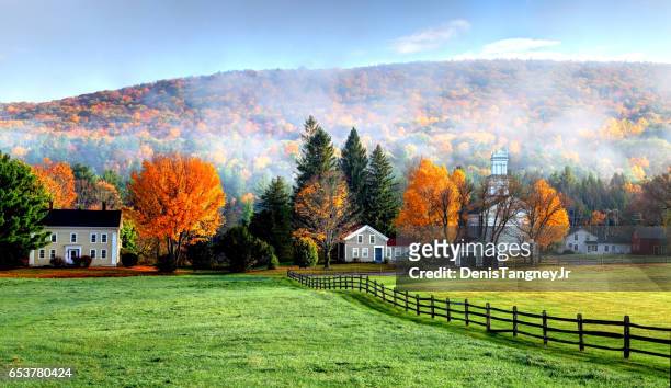 autumn mist in the village of tyringham in the berkshires - berkshires massachusetts stock pictures, royalty-free photos & images