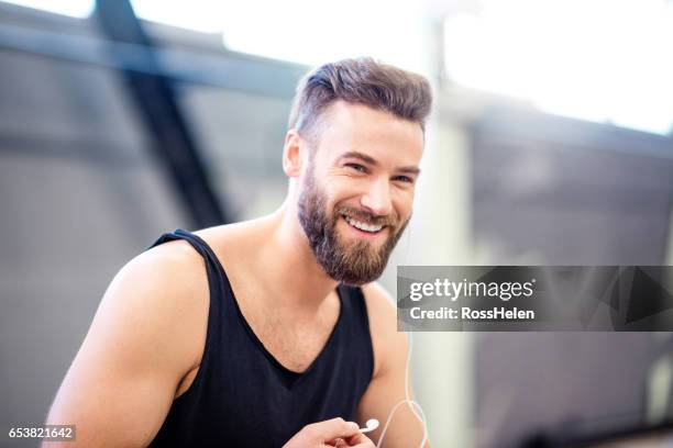 gym workout in the gym - portrait of handsome man stock pictures, royalty-free photos & images