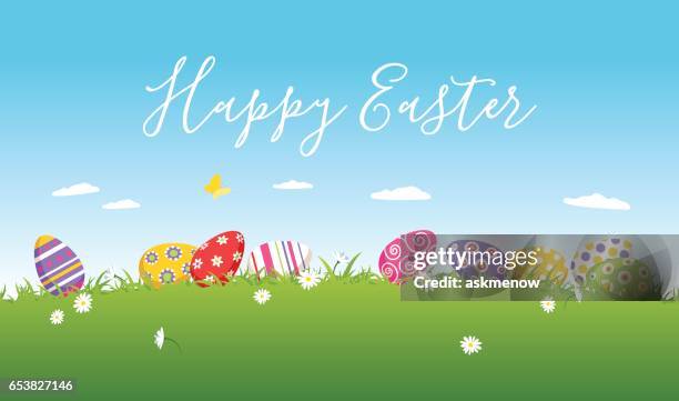 easter eggs lying in the grass - lying down grass stock illustrations