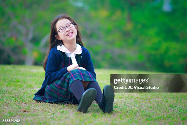 the primary school girl - miope and humor fotografías e imágenes de stock