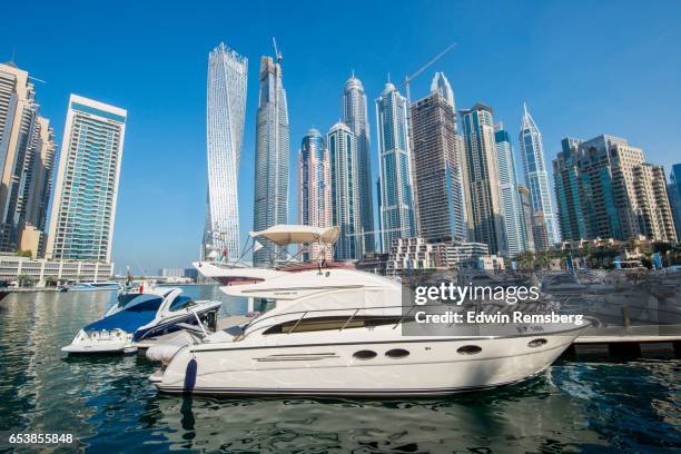 boats in the marina - luxe jacht stockfoto's en -beelden