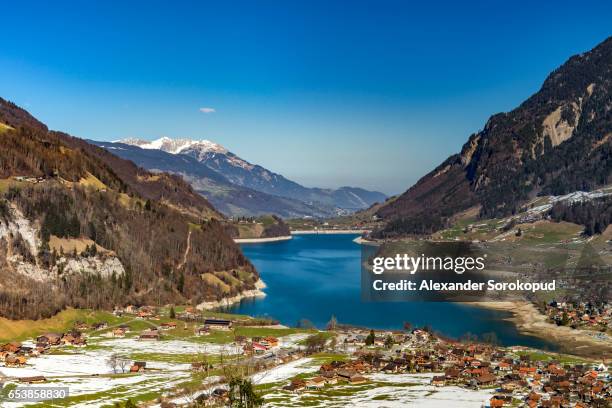 lake with azur water.switzerland. wide-angle hd-quality panoramic view. - lungern stock pictures, royalty-free photos & images