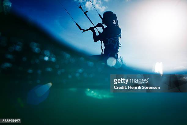 female kite surfer - kite surfing stock pictures, royalty-free photos & images