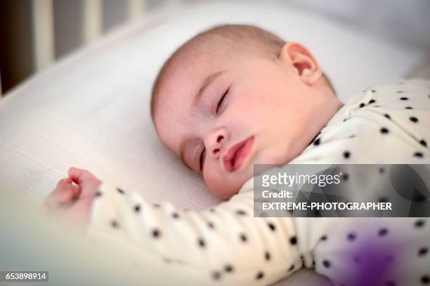 sleeping baby daughter - one baby girl only stock pictures, royalty-free photos & images