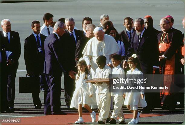 Pope John Paul II and Fidel Castro in Havana, Cuba, January 21, 1998. The pontiff is in the country for a historic five-day visit.