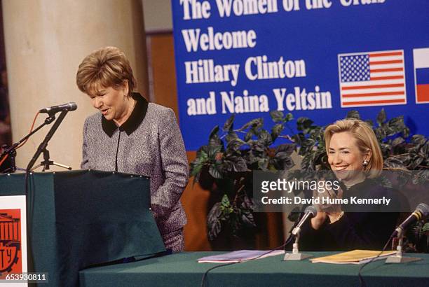 First Lady Hillary Clinton listens to an address by Mrs. Naina Yeltsin, wife of the Russian President Boris Yeltsin as she speaks through an...