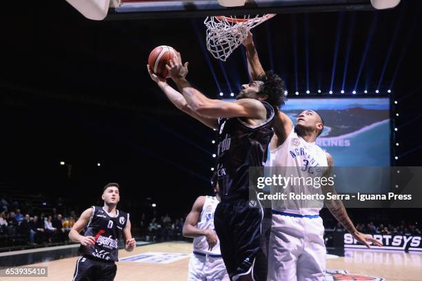 Davide Bruttini of Segafredo competes with Damen Bell Holter of Moncada during the quarter final match of Coppa Italia of Serie A2 LNP between Virtus...