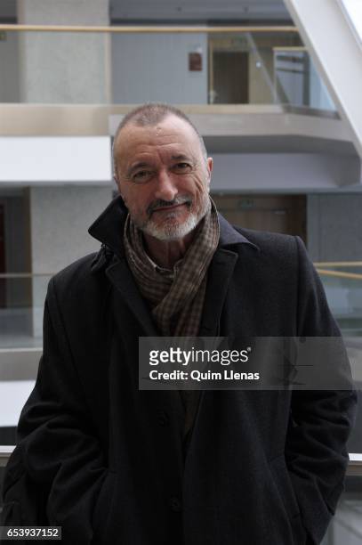 Spanish writer Arturo Perez Reverte pose for a portrait session after the press conference for the play 'El pintor de batallas' at the Canal Theatres...
