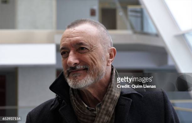 Spanish writer Arturo Perez Reverte pose for a portrait session after the press conference for the play 'El pintor de batallas' at the Canal Theatres...