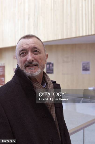 Spanish writer Arturo Perez Reverte pose for a portrait session after the press conference for the play 'El pintor de batallas' at the Canal Theatres...