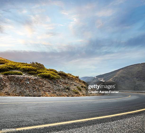 mountain road - hills stock pictures, royalty-free photos & images