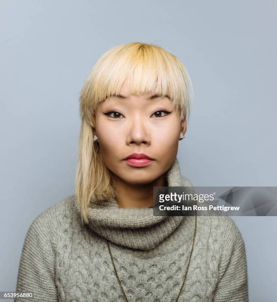 Portrait of Asian woman with blonde hair