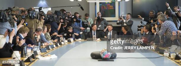 Dutch Prime Minister Mark Rutte and parliamentary leader of the People's Party for Freedom and Democracy Halbe Zijlstra speak to the press a day...