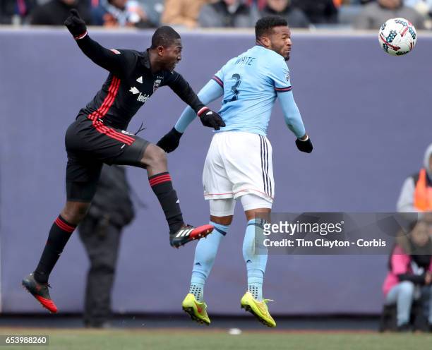 March 12: Ethan White of New York City FC is challenged by Patrick Nyarko of D.C. United during the NYCFC Vs D.C. United regular season MLS game at...