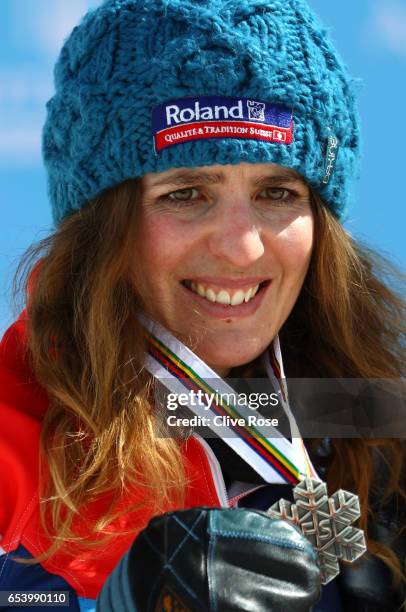 Silver medalist Patrizia Kummer of Switzerland celebrates during the medal cermony for the Women's Parallel Giant Slalom on day 9 of the FIS...