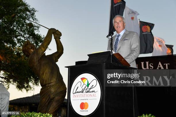 Curtis Strange speaks to a large gathering during the Arnold Palmer statue lighting ceremony at the Arnold Palmer Invitational presented by...